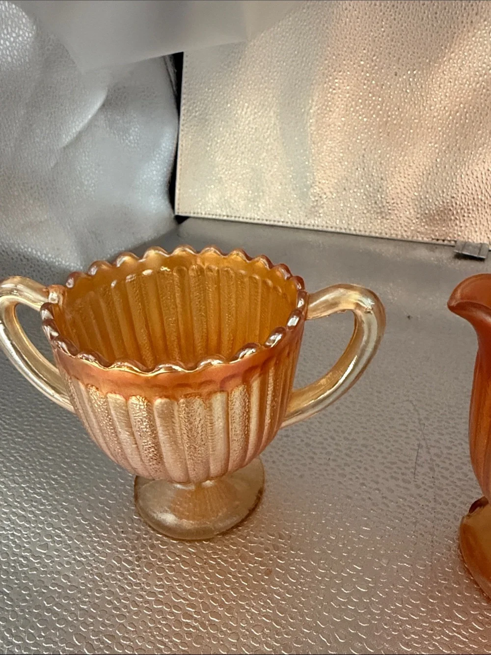 Vintage “Striped Rays” Carnival Glass sugar and creamer set.